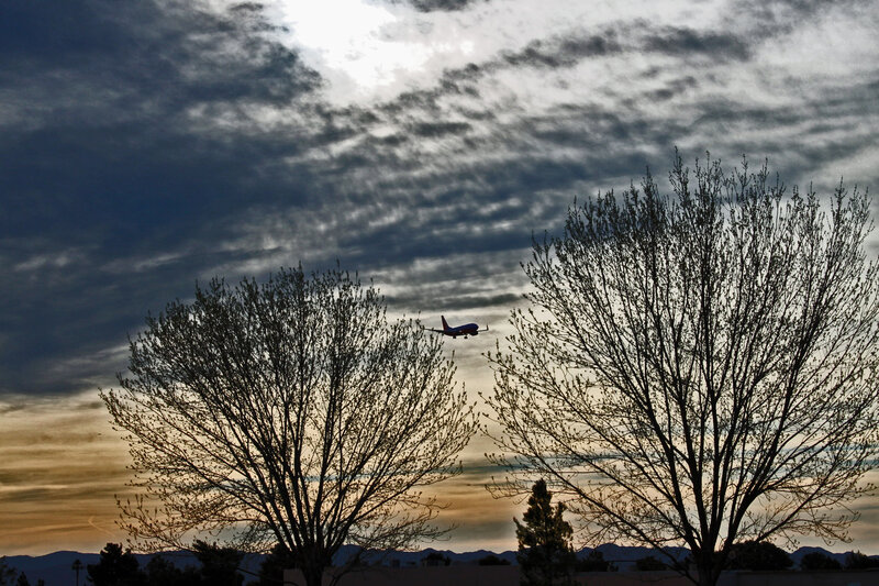 Airplane in Flight — Gray, Dramatic, Sunset, Photograph