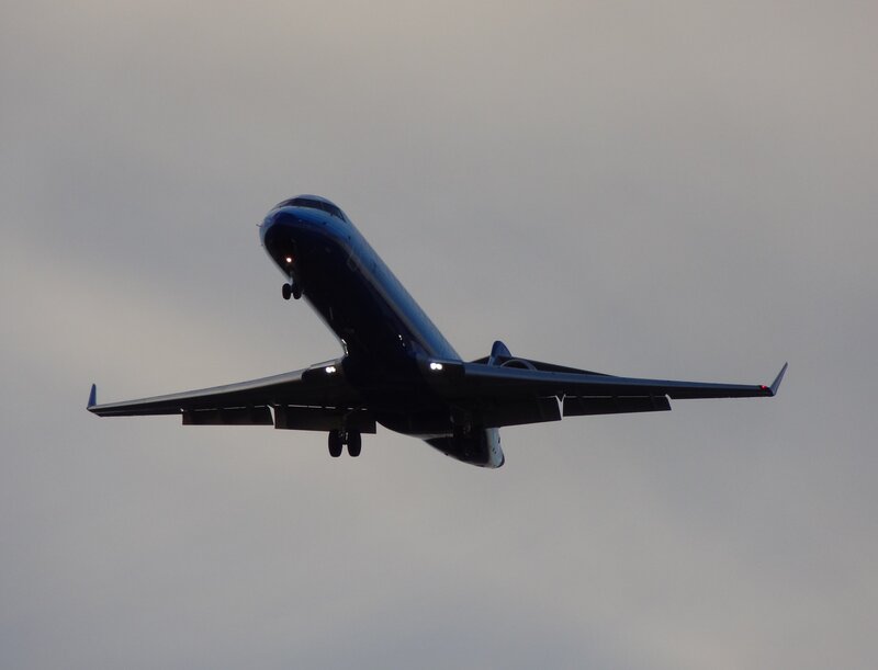 Airplane in Flight — Gray, Dramatic