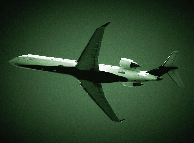 Airplane in Flight — Green, Dramatic, Night