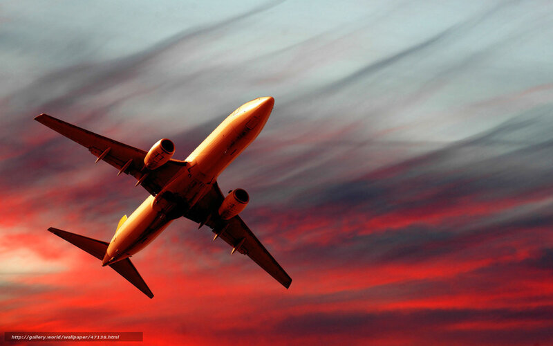 Airplane in Flight — Red, Dramatic, Sunset