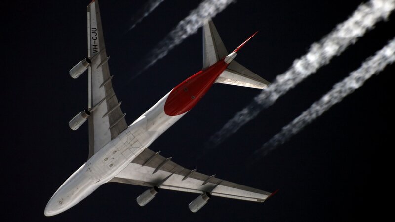 Airplane in Flight — White, Dramatic, Night, Photograph, Smoke Trails