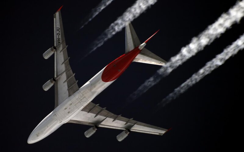 Airplane in Flight — White, Dramatic, Night