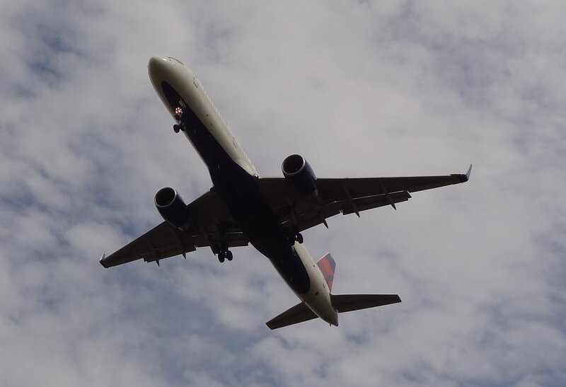 Airplane in Flight — White, Dynamic, Photograph