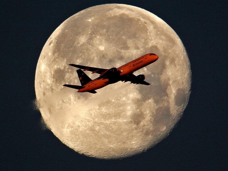 Airplane in Front of Moon — Orange