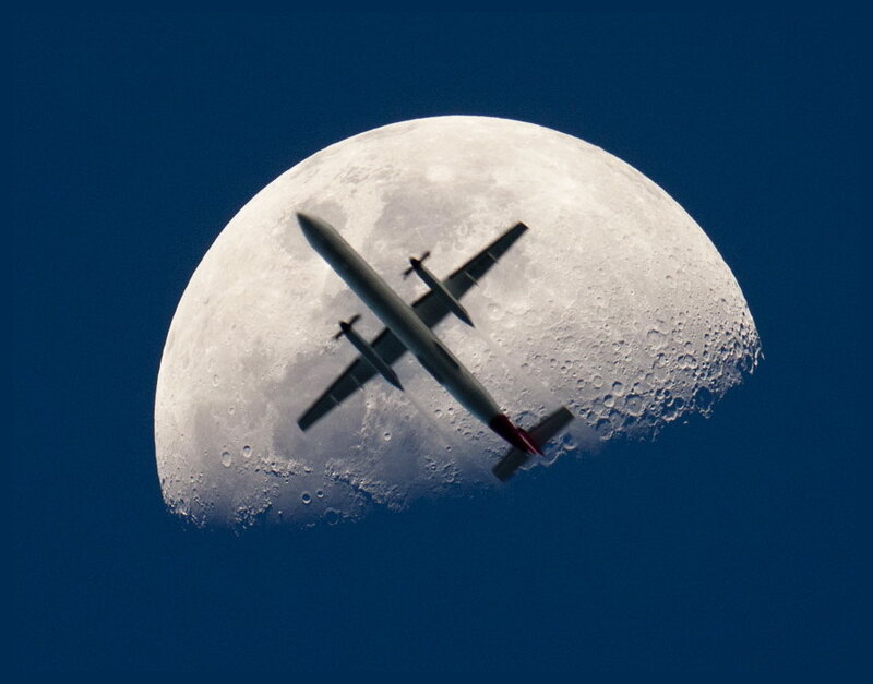 Airplane in Front of Moon