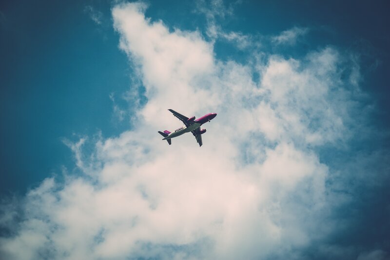 Airplane in Sky — Blue, Serene, Photograph