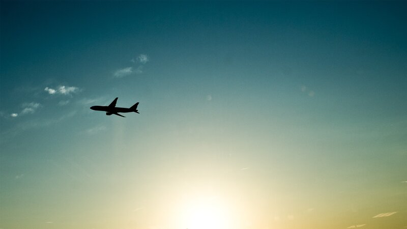 Airplane in Sky — Blue, Serene, Sunset