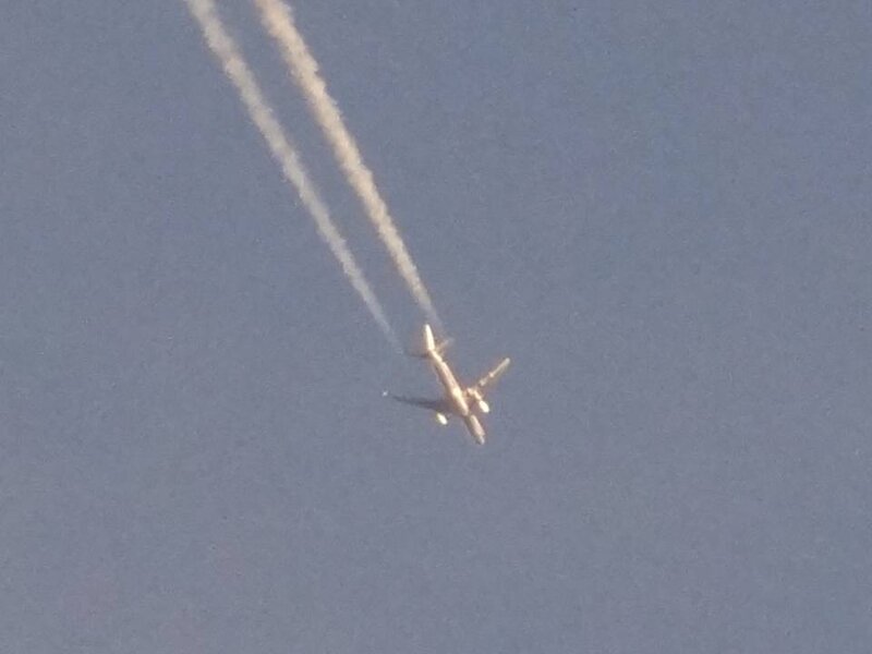 Airplane in Sky — Blue