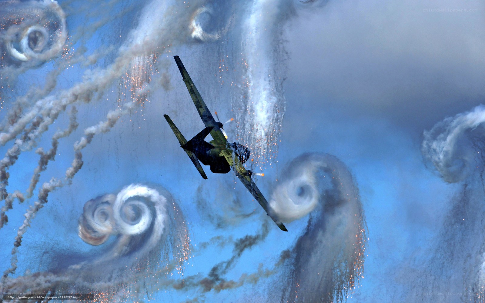 Airplane in smoke trails
