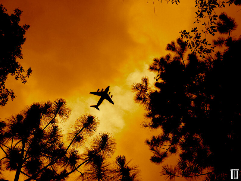 Airplane in Sunset — Orange, Dramatic