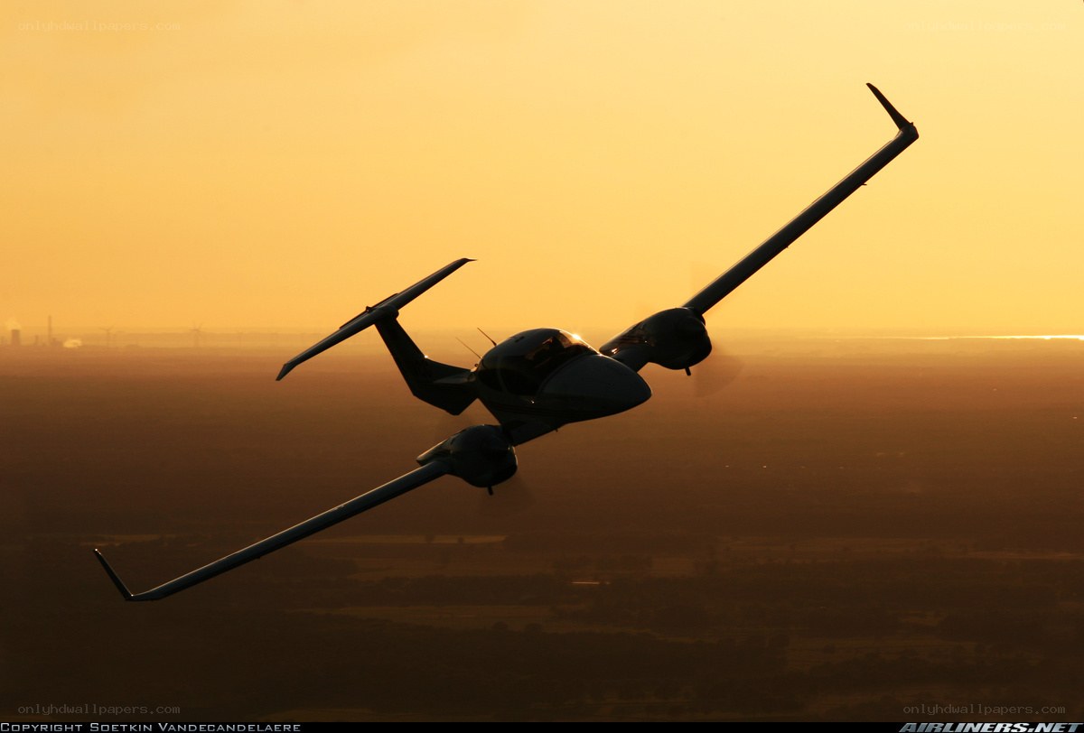 airplane in sunset silhouette