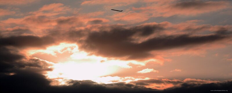 Airplane in Sunset Sky — Orange, Dramatic, Photograph, Clouds, Sun