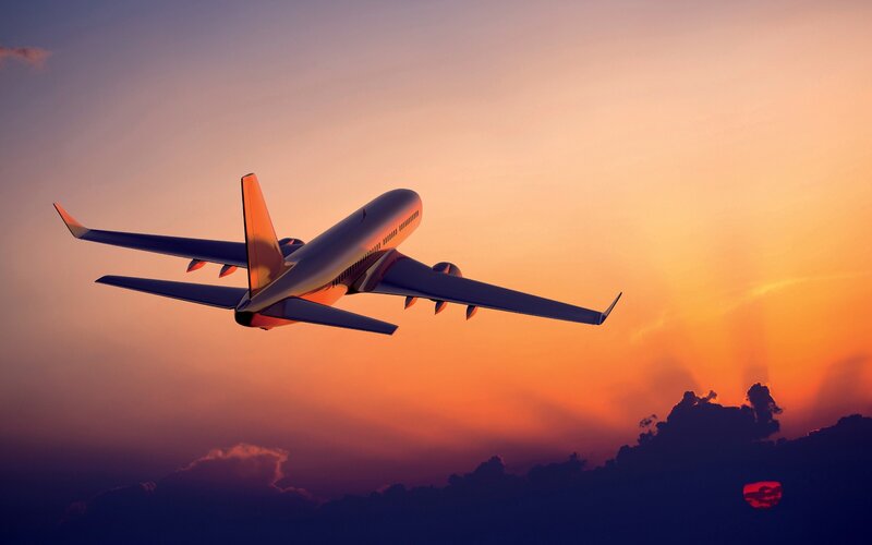 Airplane in Sunset Sky — Orange, Dramatic, Photograph, Clouds
