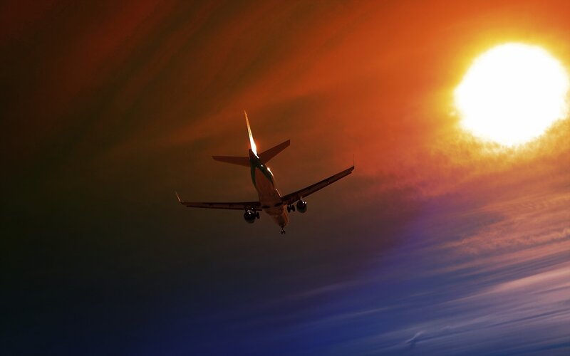 Airplane in Sunset Sky — Orange, Dramatic, Photograph, Sun