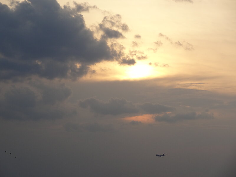 Airplane in Sunset Sky — Yellow