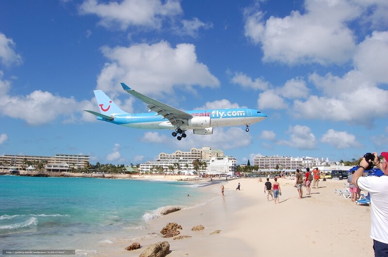 Airplane Landing at Beach