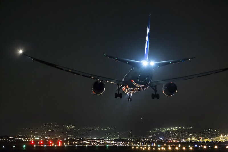 Airplane Landing at Night — Black, Dramatic