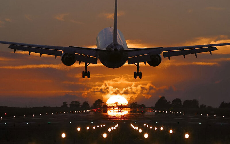 Airplane Landing at Sunset — Orange, Dramatic, Photograph, Runway