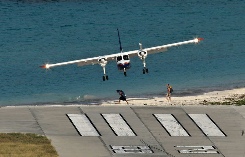 Airplane Landing on Beach — Blue, Calm