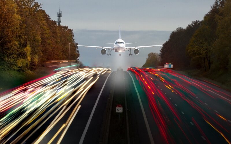 Airplane Landing on Highway