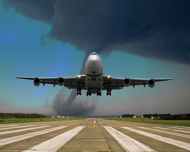 Airplane Landing on Runway — Blue