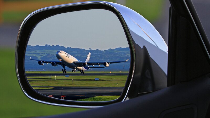 Airplane Landing on Runway — Green, Calm