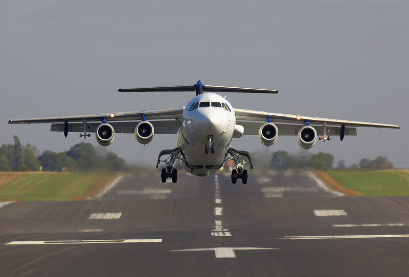 airplane landing on runway