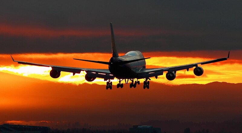 Airplane Landing — Orange, Dramatic, Sunset