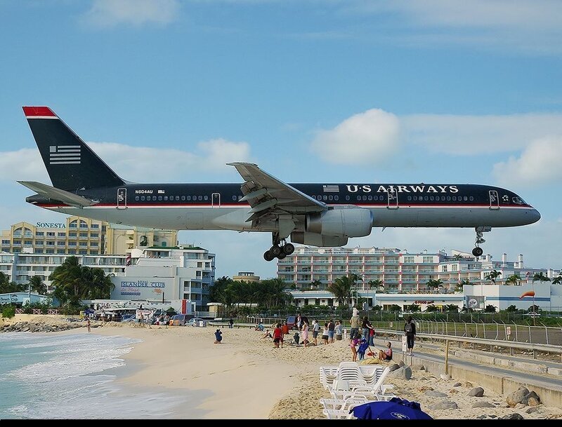 Airplane Landing over Beach — Blue, Calm