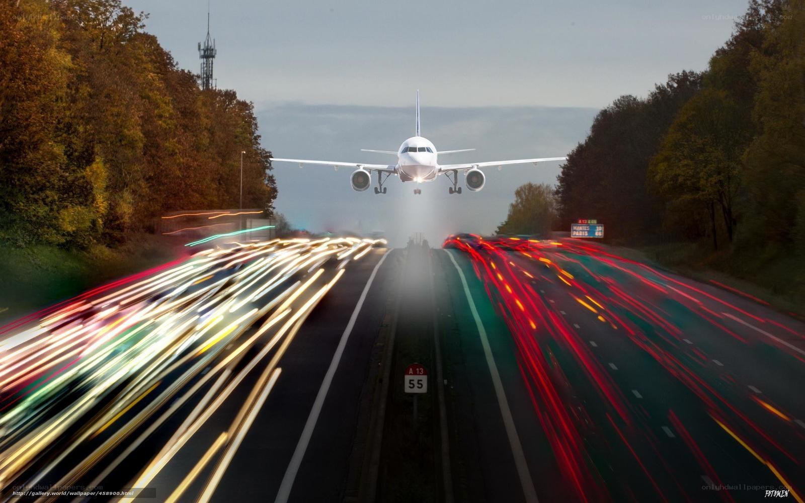 Airplane landing over highway
