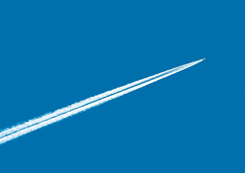 Airplane leaving contrail