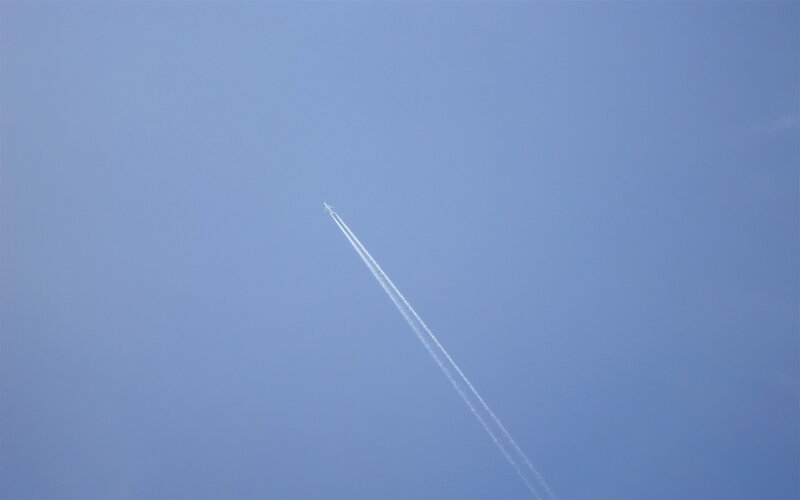 Airplane leaving contrail