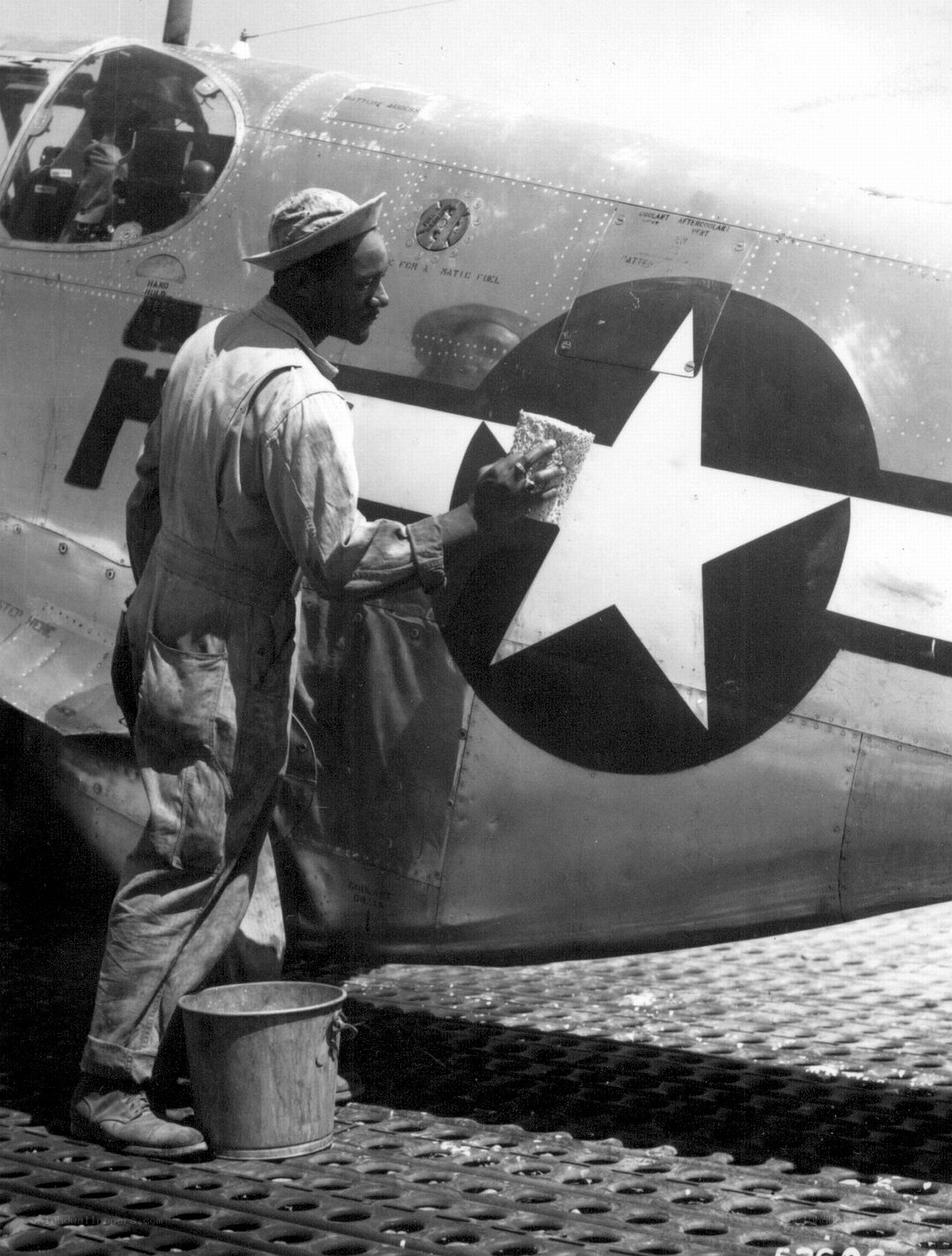 Airplane maintenance on aircraft carrier