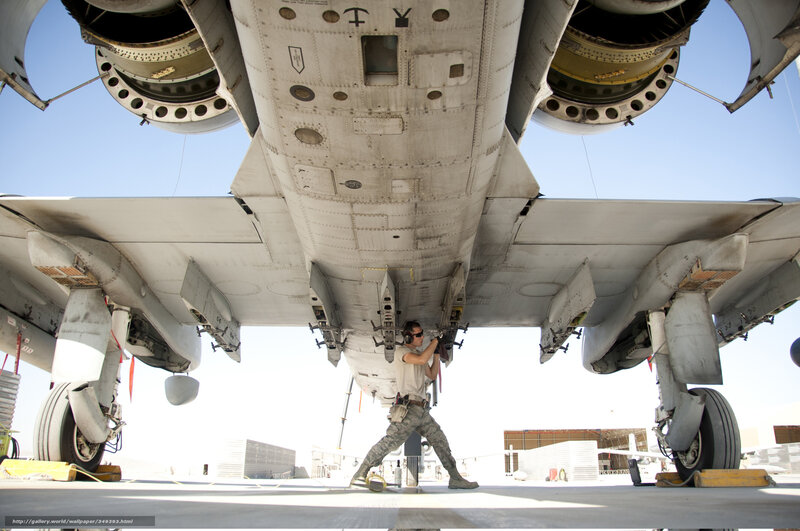 Airplane maintenance on tarmac