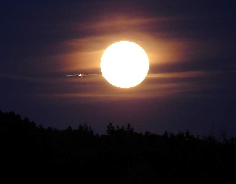 Airplane Near Full Moon