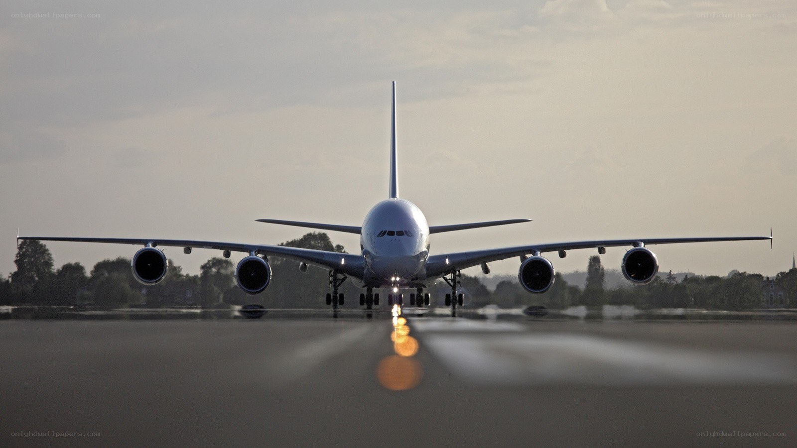 Airplane on a runway at dusk