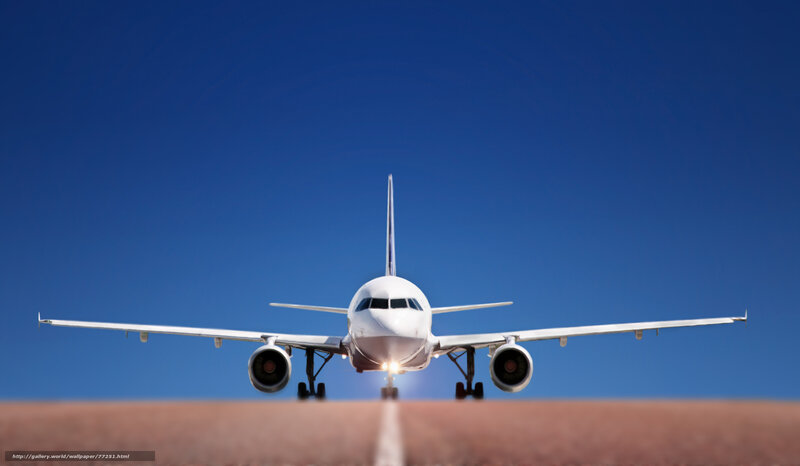 airplane on runway at sunset