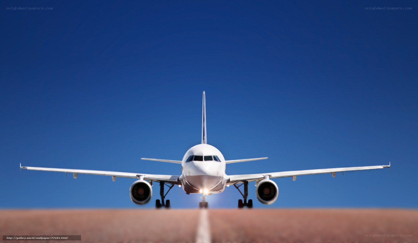 airplane on runway at sunset