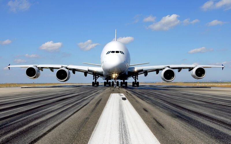 Airplane on Runway — Blue, Calm, Afternoon