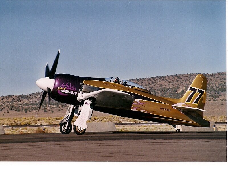 Airplane on Runway — Gold