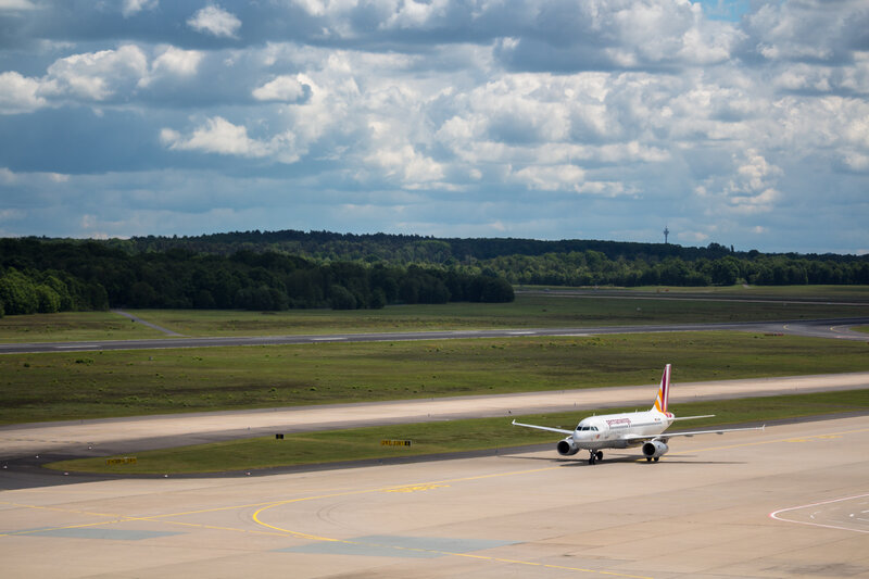 Airplane on Runway — Gray, Overcast, Afternoon