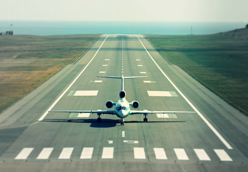 Airplane on Runway — Gray, Serene