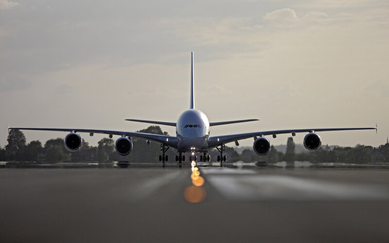Airplane on Runway — Gray