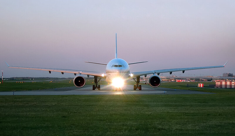 Airplane on Runway — Green, Calm