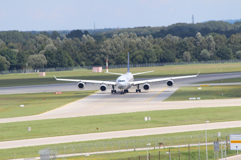 Airplane on Runway — Green