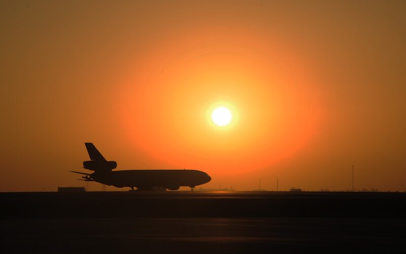 Airplane on Runway — Orange, Dramatic, Sunset, Photograph, Sun