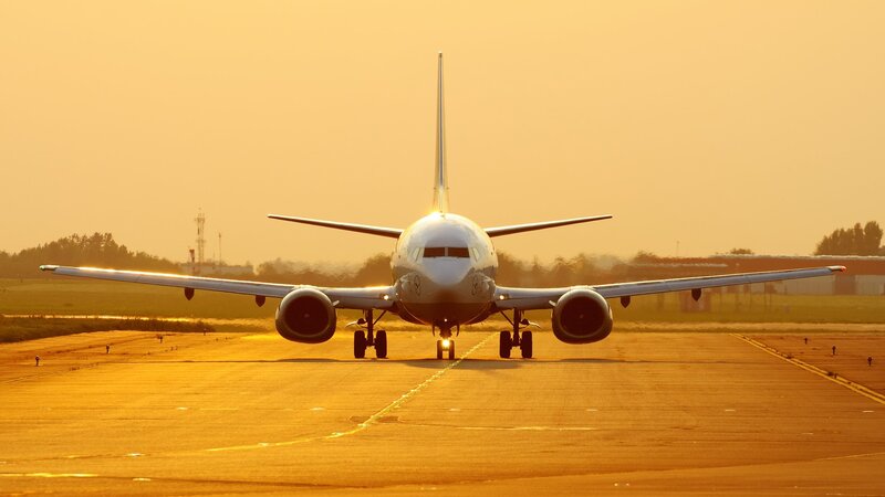 Airplane on Runway — Orange, Dramatic, Sunset, Photograph, Trees