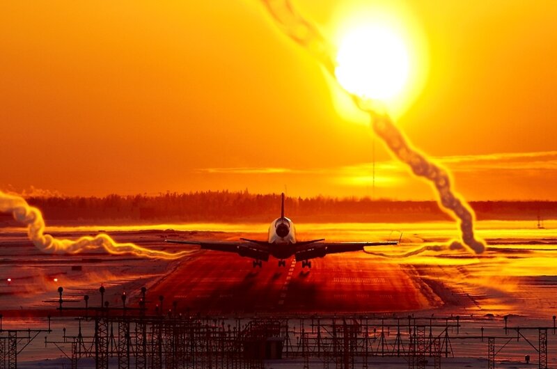 Airplane on Runway — Orange, Dramatic, Sunset