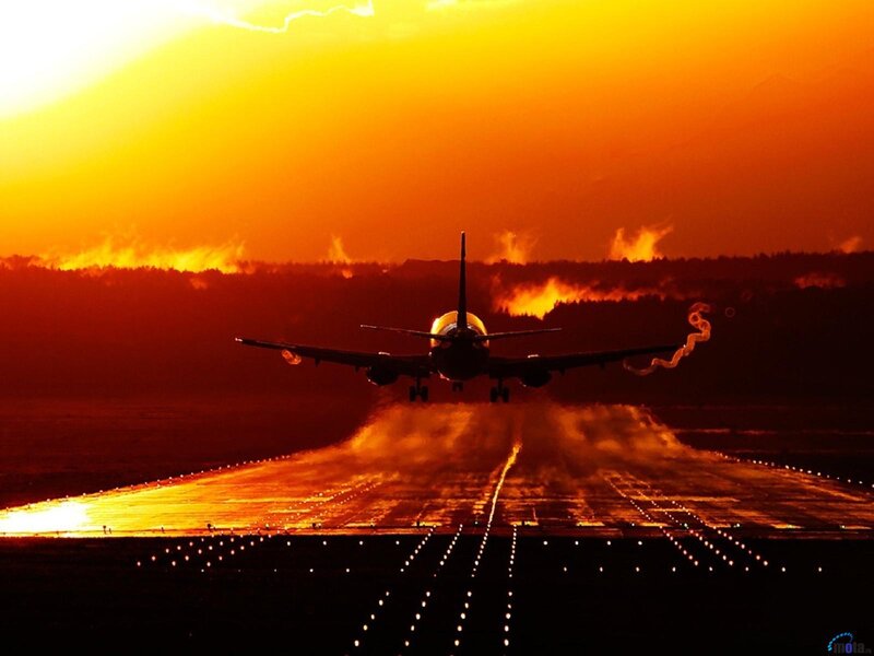 Airplane on Runway — Orange, Dramatic