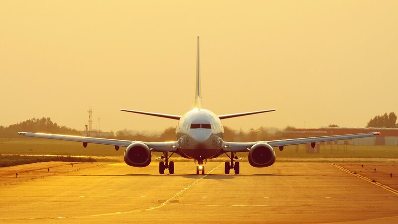 Airplane on Runway — Orange, Serene, Sunset, Photograph, Trees, Yellow, Brown